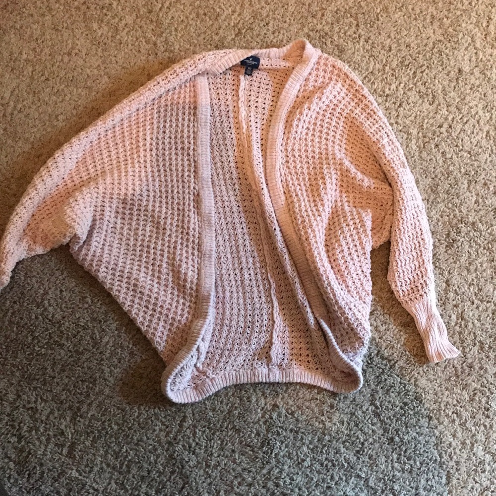 Pink knit sweater, bunches wrists